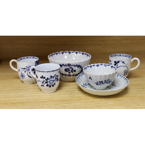 375 - A Liverpool tea bowl and saucer painted with trailing flowers, the saucer with an additional central... 