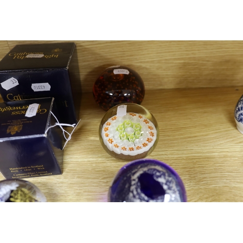 383 - A selection of thirteen mixed decorative paperweights