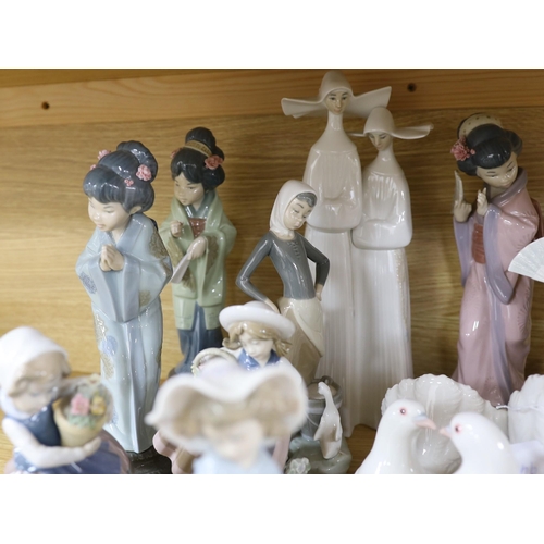 386 - A selection of fifteen Lladro figures, tallest 35cm