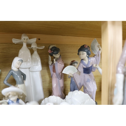 386 - A selection of fifteen Lladro figures, tallest 35cm
