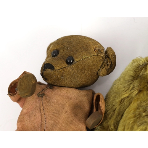 393 - An modern Teddy bear in early 20th century-style with boot-button eyes, 12in., and two other Teddy b... 