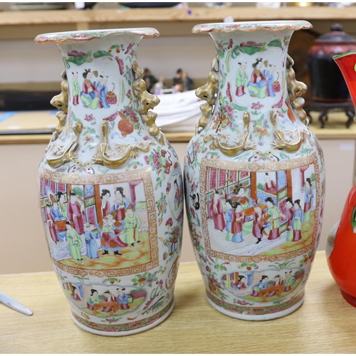 398 - A large pair of 19th century Chinese export famille rose vases, 45cm (a.f.)