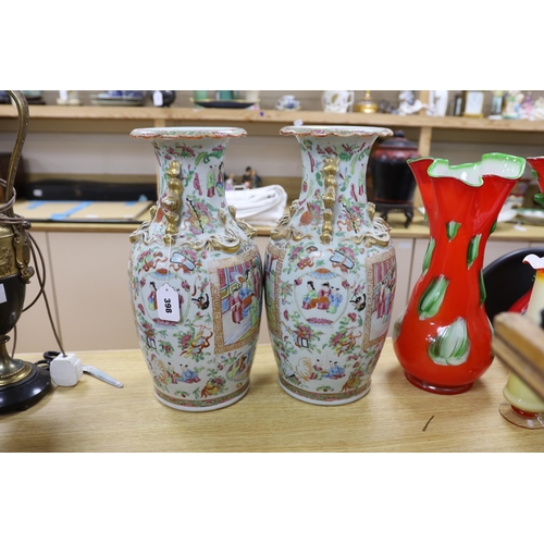 398 - A large pair of 19th century Chinese export famille rose vases, 45cm (a.f.)