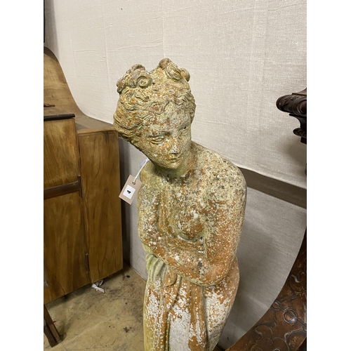 4 - A reconstituted stone garden statue of a female bather, height 117cm