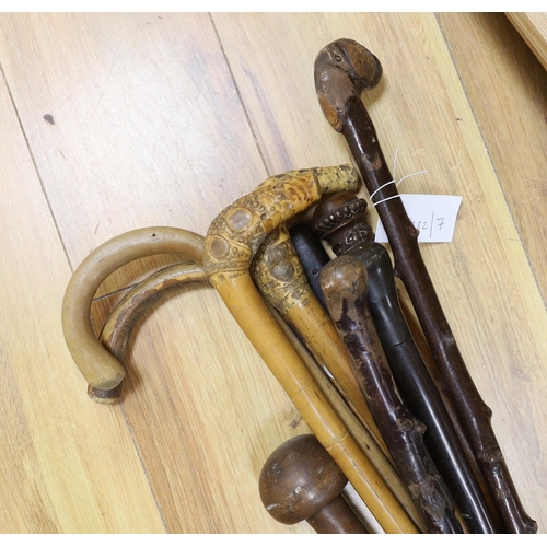 414 - Nine assorted walking sticks and canes and a knobkerrie