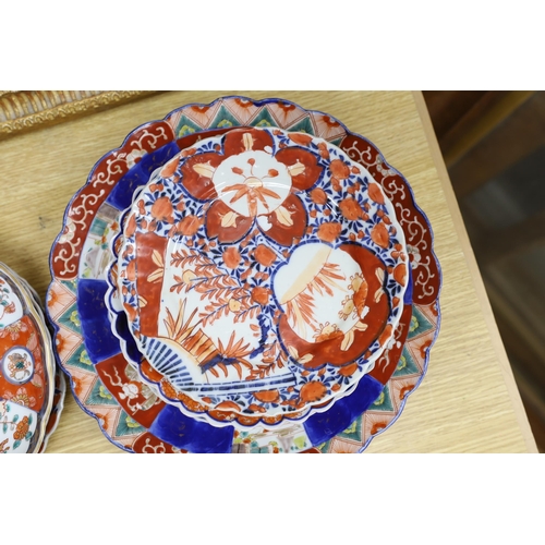 424 - Eleven Japanese Imari dishes and plates