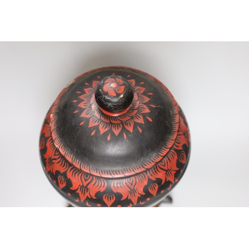 433 - A Burmese papier mache vase and cover on hardwood stand, 40cm
