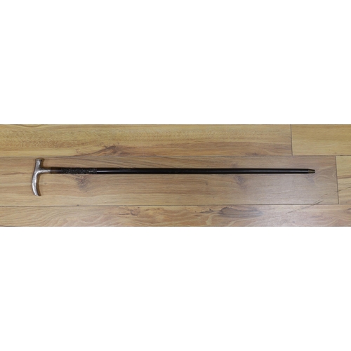 435 - A Chinese silver mounted carved hongmu walking stick, 92cm