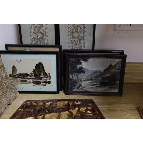 450 - A Chinese carved giltwood  warriors panel, 45cm x 30cm a pair of sleeve bands and three framed Chi... 