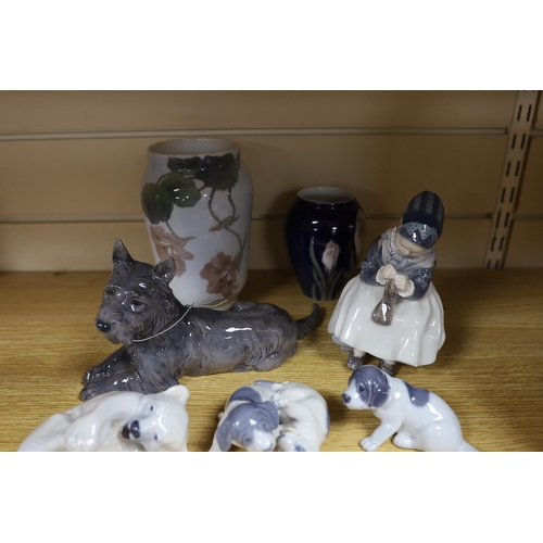 470 - Four Royal Copenhagen figures and animals, two similar vases and a Bing and Grondahl terrier
