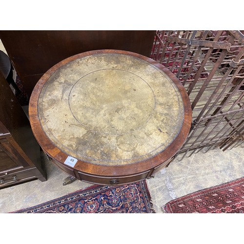 49 - A reproduction mahogany small drum table with tooled green leather top, diameter 76cm, height 71cm... 