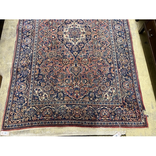 53 - An Isphahan red ground rug, 206 x 133cm together with a Bokhara red ground runner