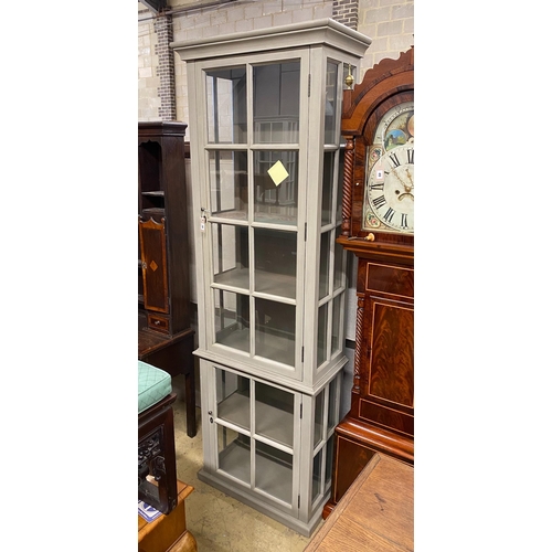 9 - An eau de nil painted display cabinet, width 73cm, depth 39cm, height 230cm