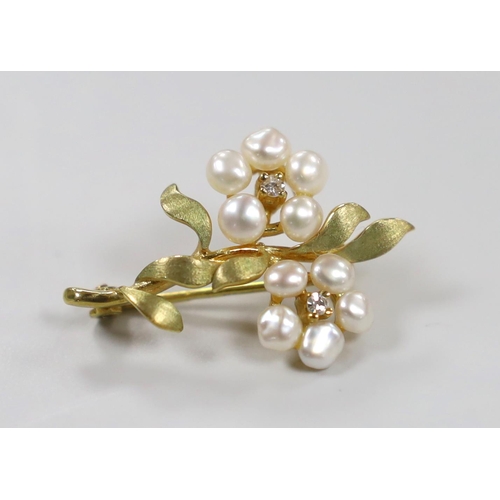 976 - A modern 9ct gold, cultured pearl and diamond cluster set twin flower head brooch, 29mm, gross weigh... 