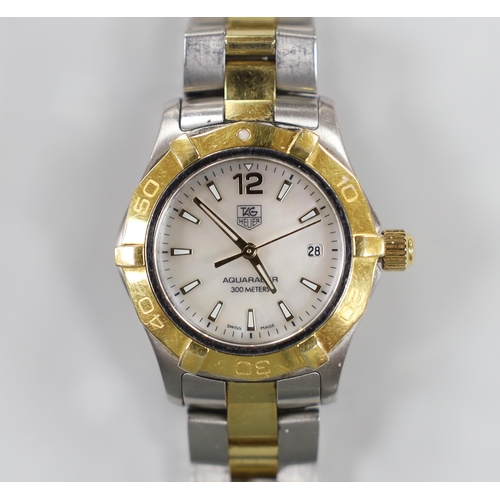 977 - A lady's modern steel and gold plated Tag Heuer Aquaracer quartz wrist watch, with mother of pearl d... 