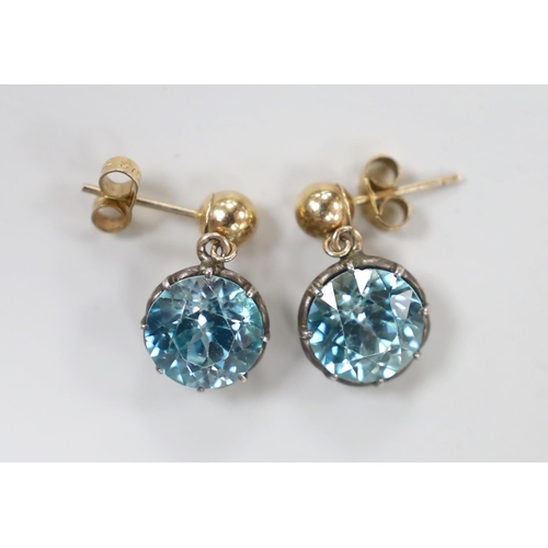 984 - A pair of 375  yellow metal and blue zircon set  earrings, 9mm, gross weight 4.4 grams.