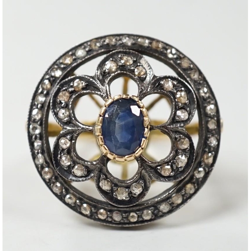 990 - An Indian pierced yellow metal, sapphire and rose cut diamond set circular cluster ring, size N/O, g... 