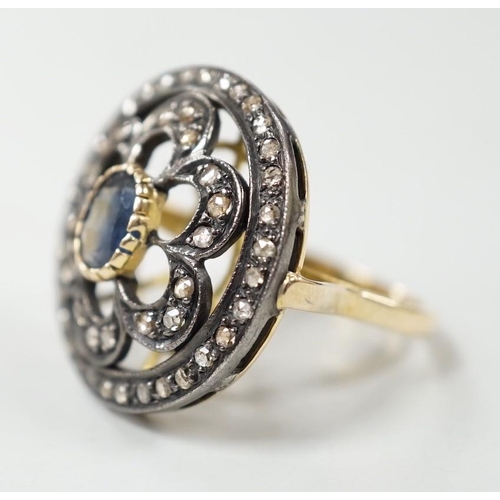 990 - An Indian pierced yellow metal, sapphire and rose cut diamond set circular cluster ring, size N/O, g... 