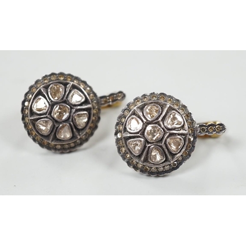 991 - A pair of Indian, yellow and white metal, rose and round cut diamond set target cluster earrings, di... 