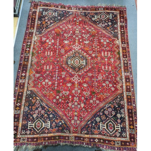 1233A - A Hamadan red ground carpet, 294 x 216cm