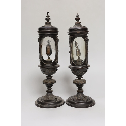 1254 - A pair of Victorian walnut reliquaries, 29cm