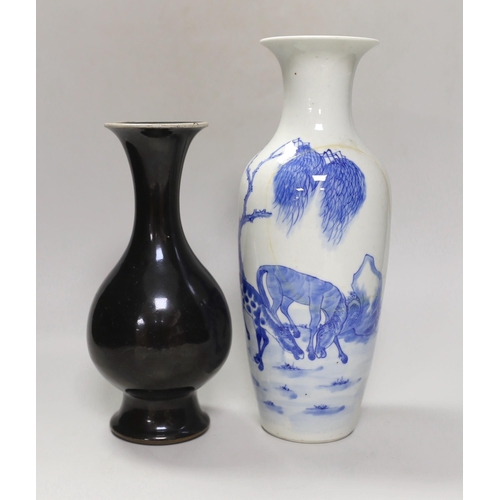 1269 - A Chinese mirror-black glazed vase, 18th century and a 19th century Chinese blue and white 'horses' ... 