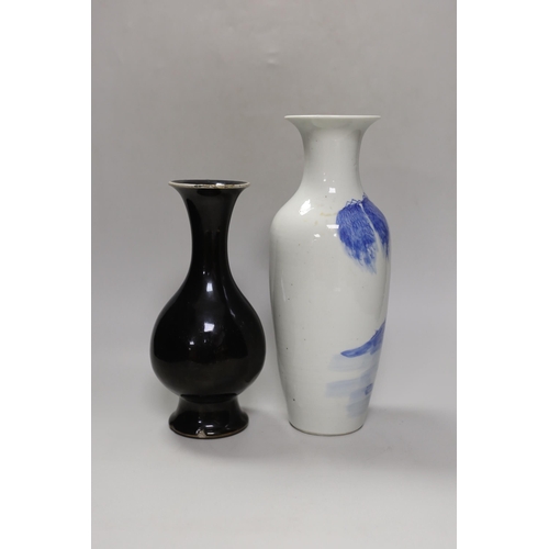 1269 - A Chinese mirror-black glazed vase, 18th century and a 19th century Chinese blue and white 'horses' ... 