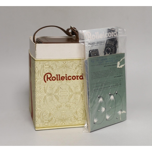 1270 - A boxed Rolleicord V series camera with paperwork and original receipt.