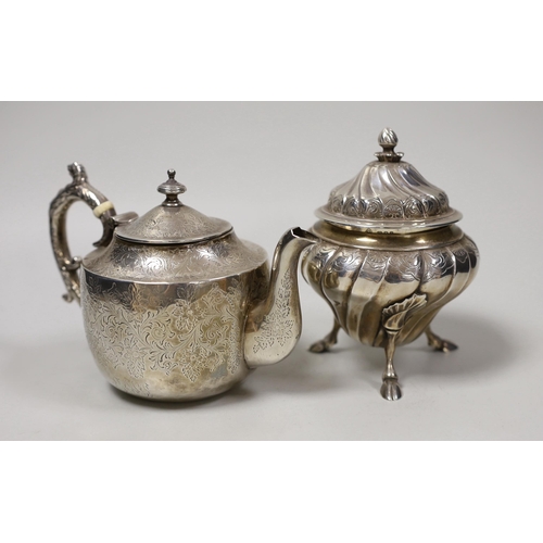 A small Victorian Scottish silver bachelor's teapot with ivory