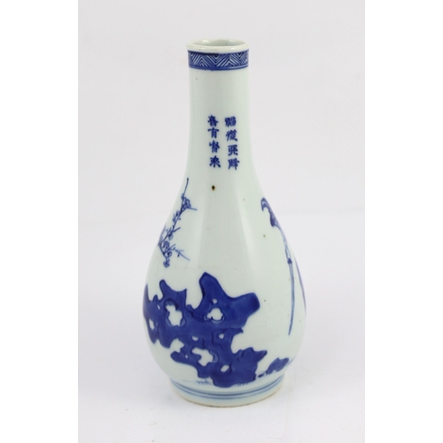 116 - A Chinese blue and white Zhong Kui inscribed bottle vase, early Kangxi period, painted with Zhong ... 