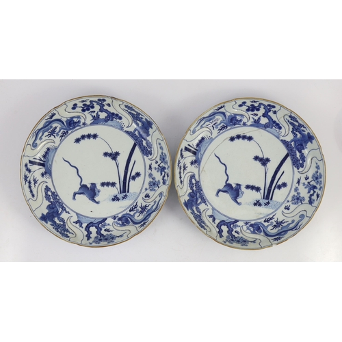 117 - A pair of Chinese blue and white armorial dishes in Japanese Kakiemon style, Qianlong period, c.1752... 