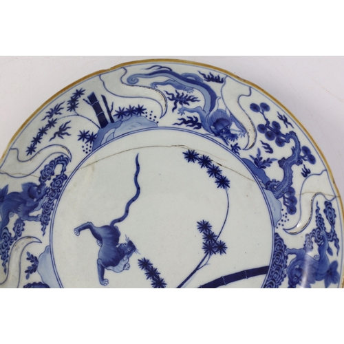 117 - A pair of Chinese blue and white armorial dishes in Japanese Kakiemon style, Qianlong period, c.1752... 