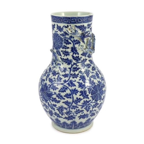 118 - A Chinese blue and white lotus vase, first half 19th century, the cylindrical neck modelled in rel... 