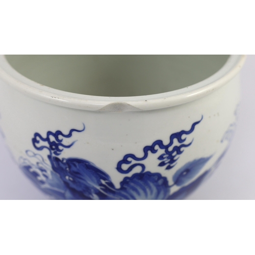 100 - A Chinese blue and white mythical beasts jardiniere, Kangxi period, the moulded rim above an ovoid... 