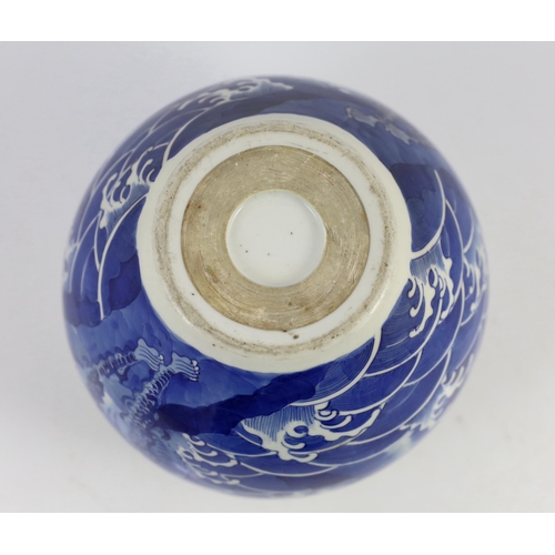 100 - A Chinese blue and white mythical beasts jardiniere, Kangxi period, the moulded rim above an ovoid... 