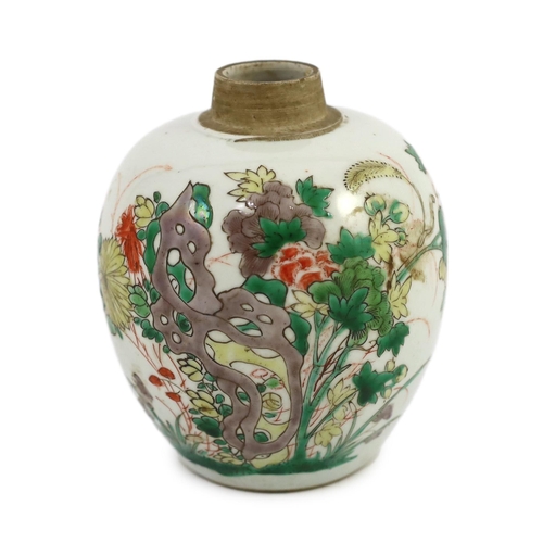 107 - A Chinese famille verte small ovoid jar, Kangxi period, painted with rocks, flowers, foliage and two... 