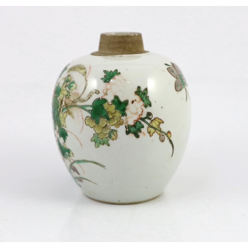 107 - A Chinese famille verte small ovoid jar, Kangxi period, painted with rocks, flowers, foliage and two... 