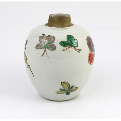 107 - A Chinese famille verte small ovoid jar, Kangxi period, painted with rocks, flowers, foliage and two... 