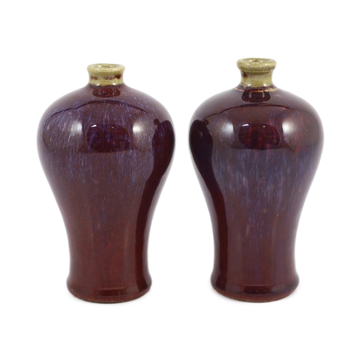 114 - A near pair of Chinese flambé glazed meiping, 18th century, each mushroom coloured neck above a purp... 