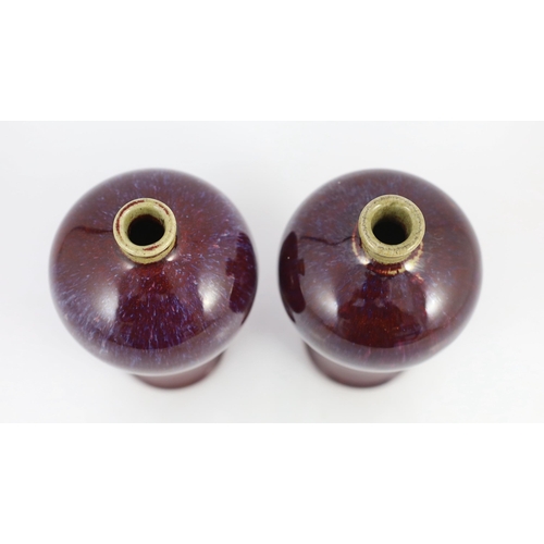 114 - A near pair of Chinese flambé glazed meiping, 18th century, each mushroom coloured neck above a purp... 