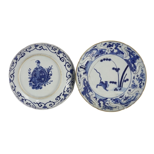 117 - A pair of Chinese blue and white armorial dishes in Japanese Kakiemon style, Qianlong period, c.1752... 