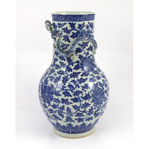 118 - A Chinese blue and white lotus vase, first half 19th century, the cylindrical neck modelled in rel... 