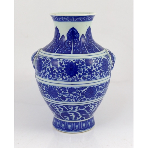 135 - A Chinese blue and white lotus vase, hu, Qianlong seal mark but Republic period, moulded with a pa... 