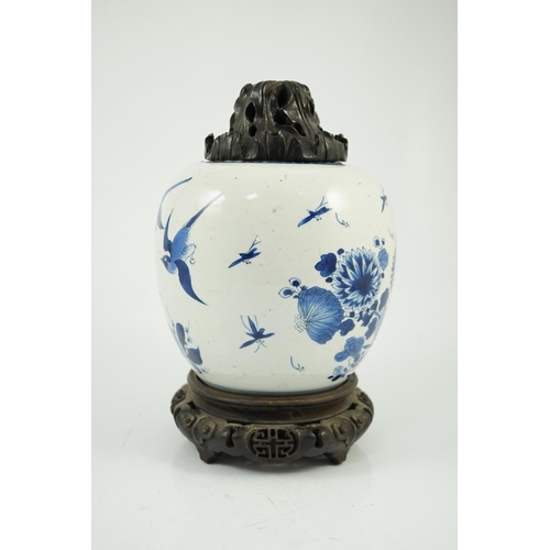 138 - A Chinese blue and white birds and rockwork ovoid jar, Kangxi period, painted with three birds in ... 