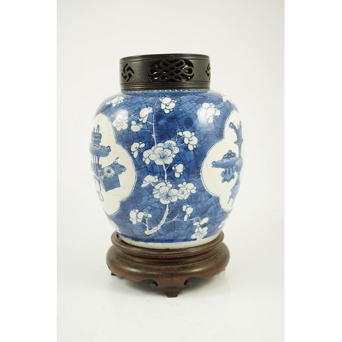 140 - A Chinese blue and white Antiques ovoid jar, Kangxi period, painted with four shaped reserves of a... 