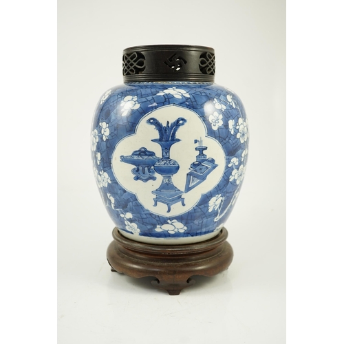 140 - A Chinese blue and white Antiques ovoid jar, Kangxi period, painted with four shaped reserves of a... 