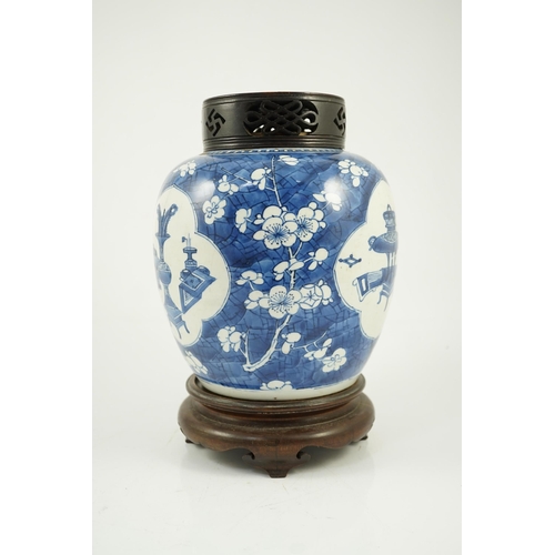 140 - A Chinese blue and white Antiques ovoid jar, Kangxi period, painted with four shaped reserves of a... 