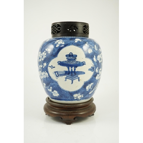 140 - A Chinese blue and white Antiques ovoid jar, Kangxi period, painted with four shaped reserves of a... 