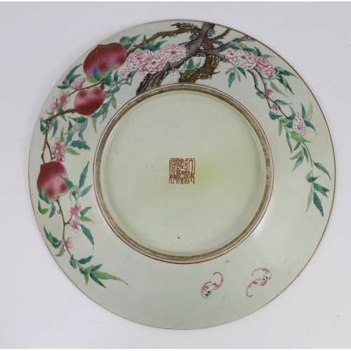 142 - A large Chinese nine peach enamelled porcelain dish, Qianlong seal mark but 19th century, painted ... 