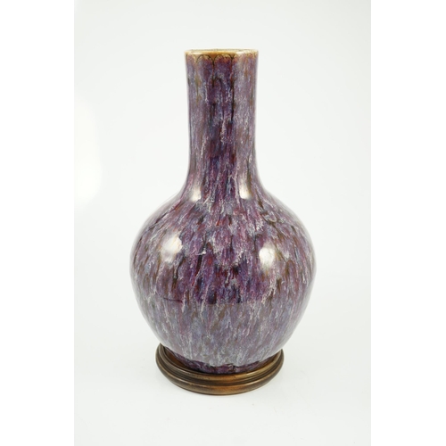 145 - A large Chinese flambé-glazed bottle vase, tianqiuping, 18th/19th century, covered in a thick purple... 